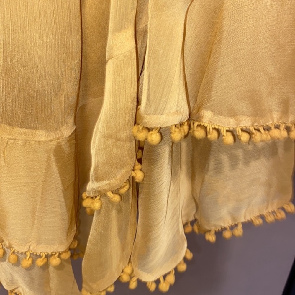 Beautiful mustard dress with tassel detailing and open cut style on sides - Picture 4 of 6